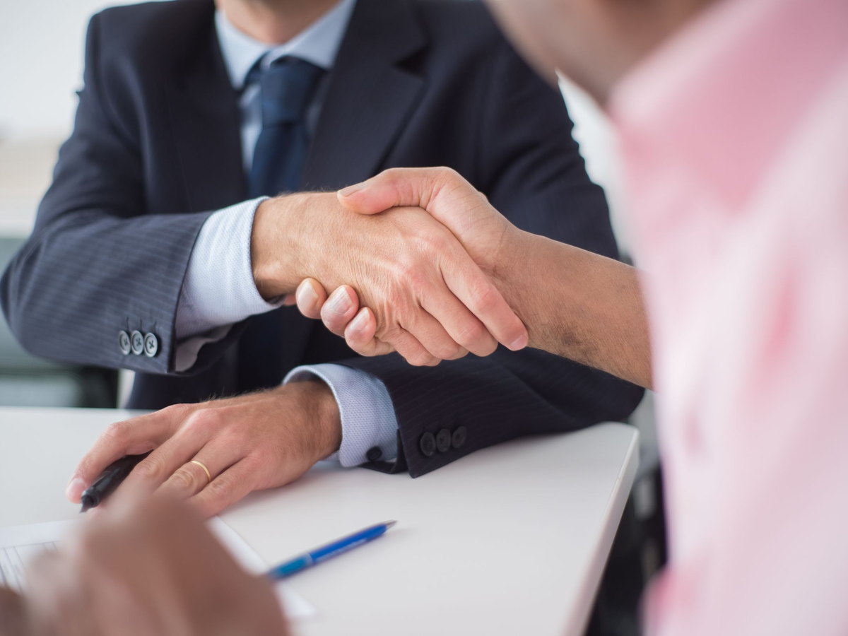 A candidate meeting a recruiter at a campus hiring drive